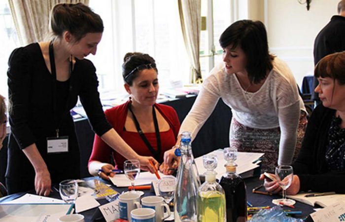 Georgina Brown working with a group during an NAFS session.